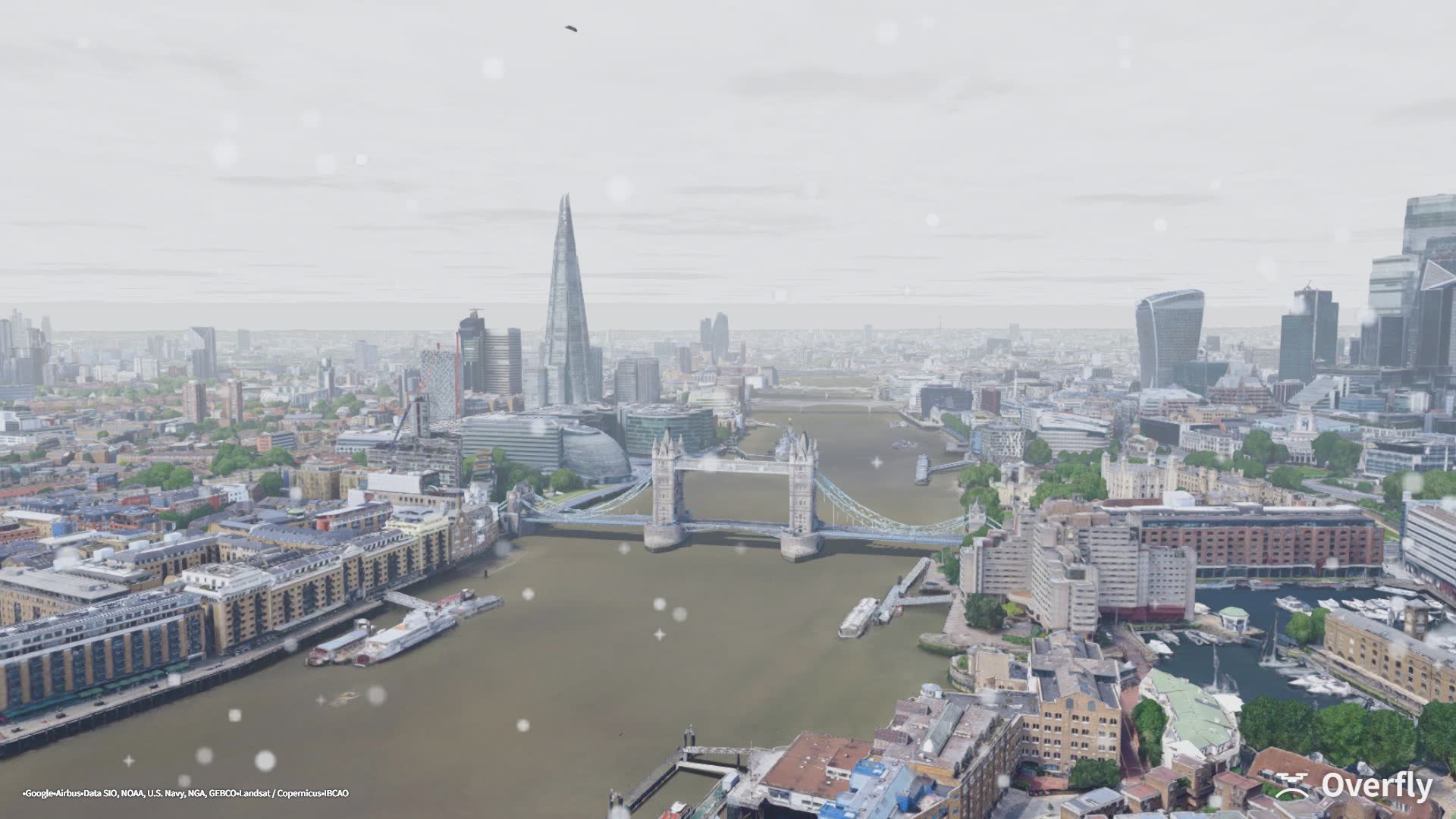 Overfly screenshot: Tower Bridge in snow, flakes on the camera lens